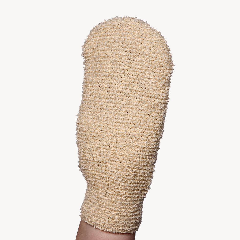 exfoliating mitt with hand in the mitt