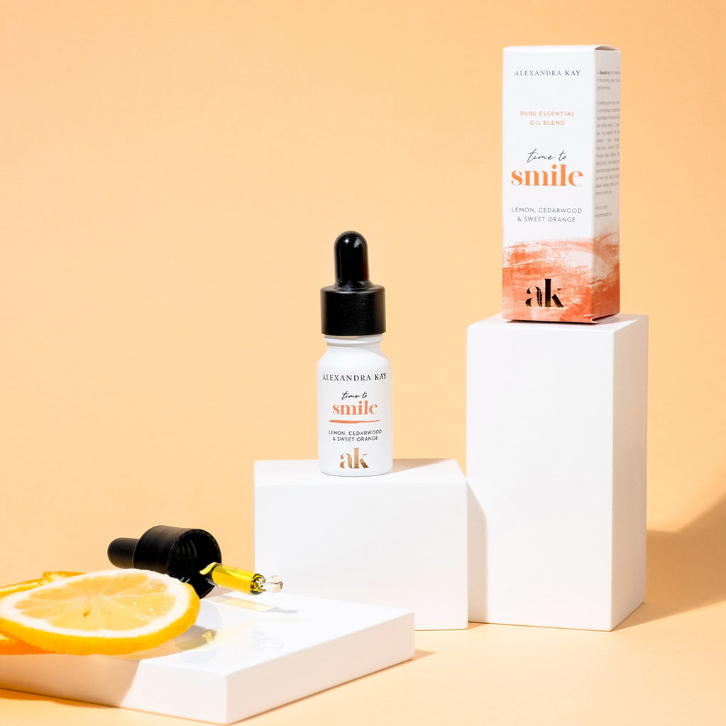 Alexandra Kay Time to Smile Essential Oil Blend with orange slice