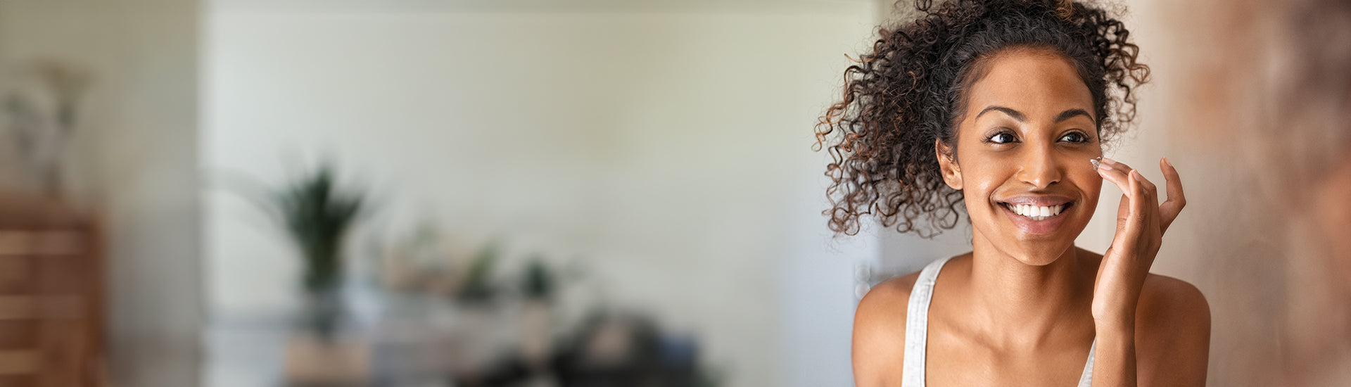 woman applying alcohol-free face wash