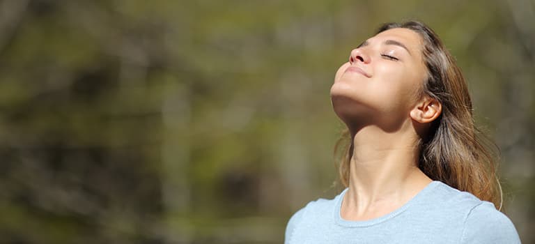 image for anti-ageing spf moisturiser category featuring woman smiling in sunshine